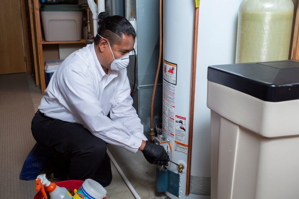 waterheatermaintenance4maletechnician9inmask