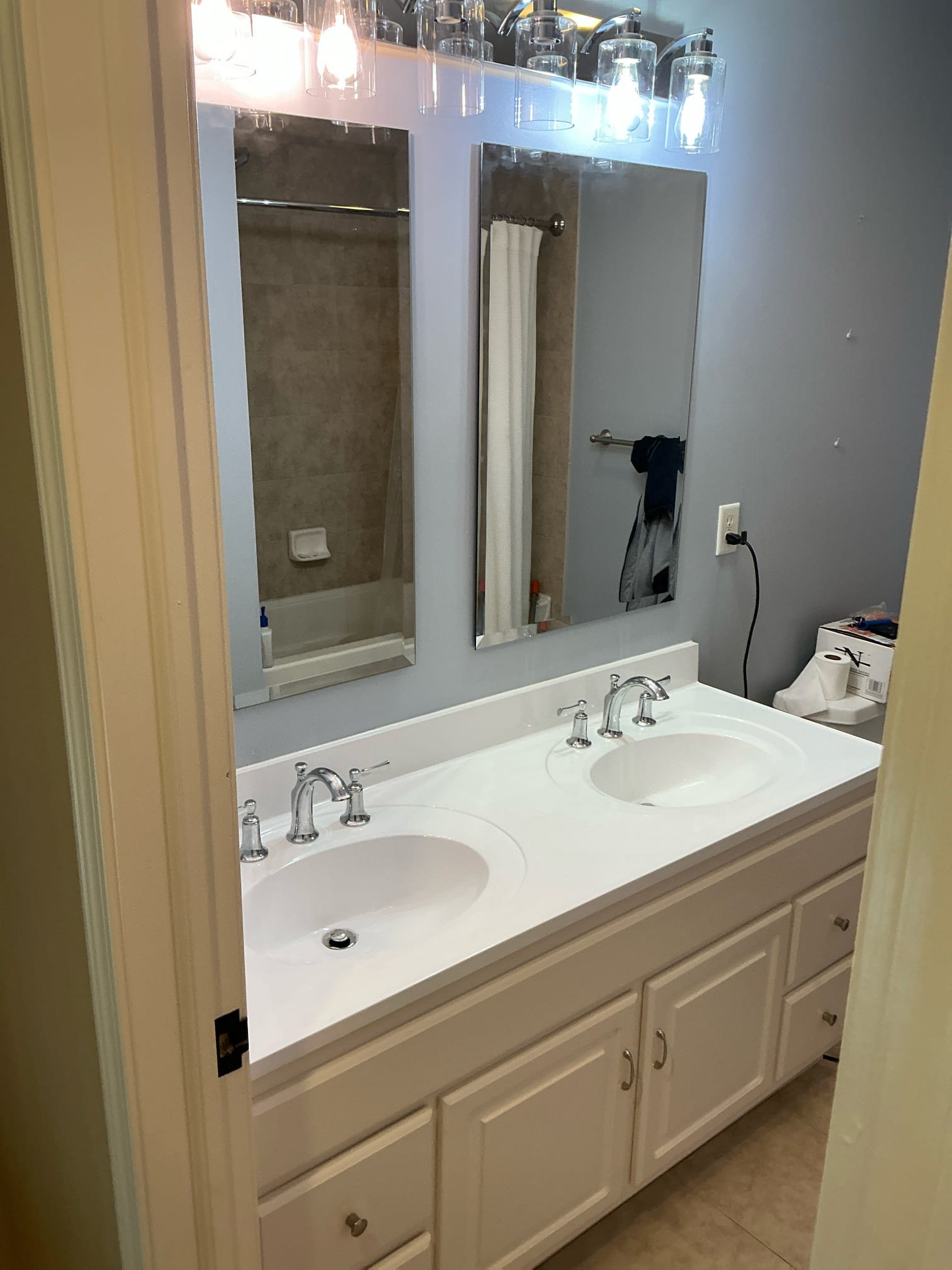 Single-sink bathroom before double-sink vanity plumbing upgrade by Cellino Plumbing in Williamsville, NY.