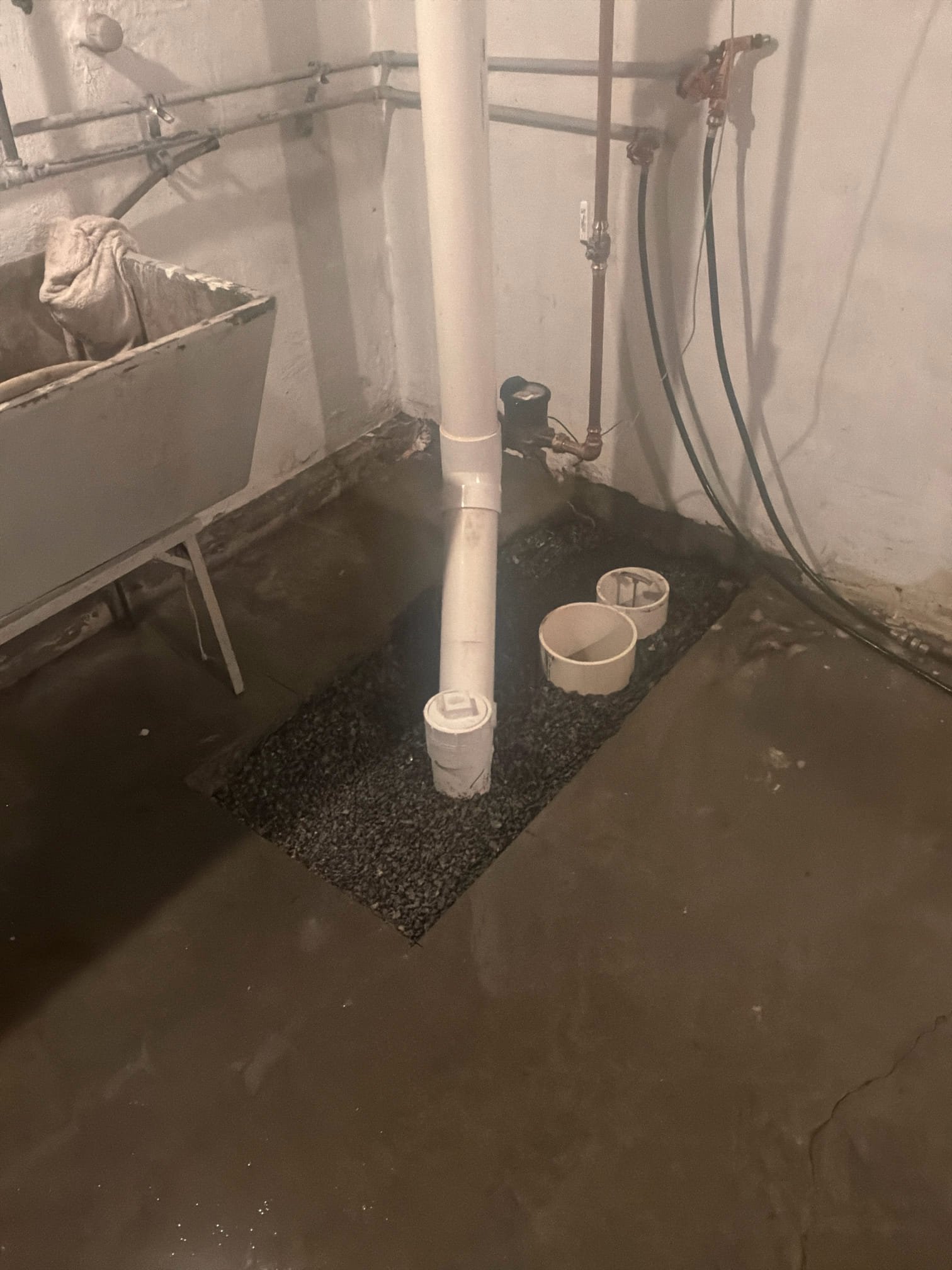 Concrete cut and broken up to access underground sewer and water lines during repair project by Cellino in Cheektowaga, NY.