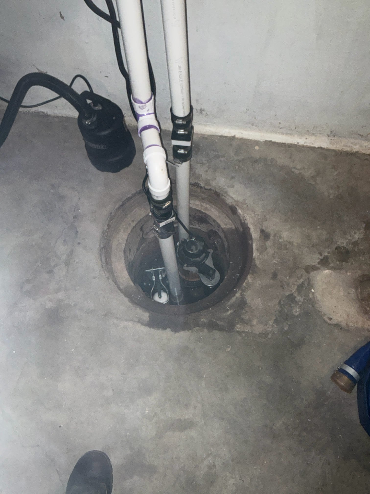 Concrete floor before excavation for underground sewer and water line repair by Cellino Plumbing in Cheektowaga, NY.